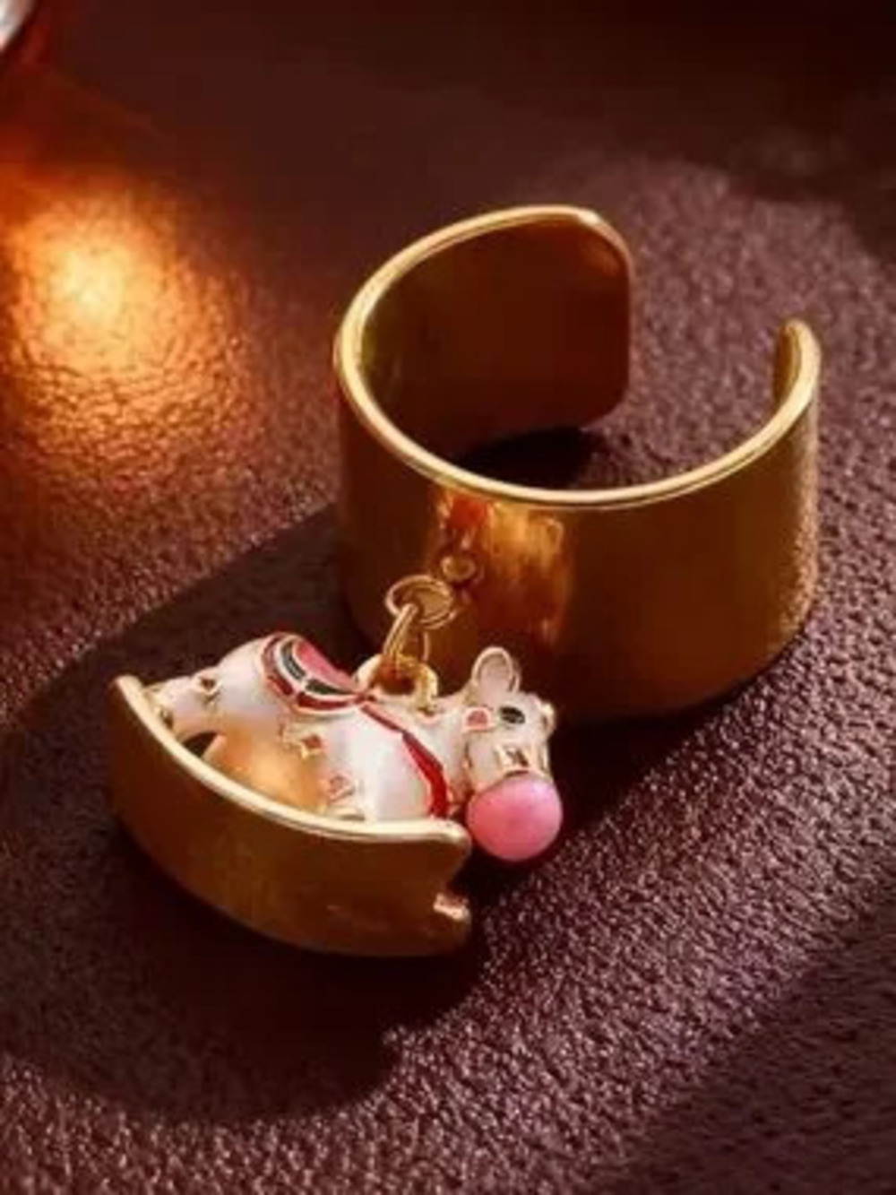 Anthropologie Gold-Tone Elephant Charm Cuff with Pink Accent
